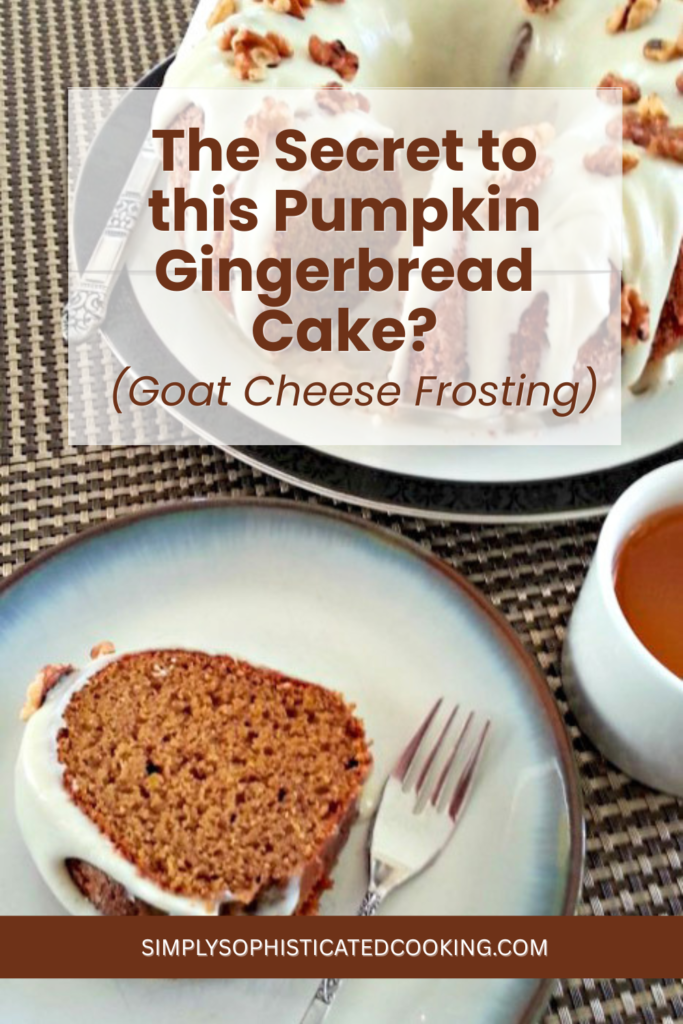 Whole pumpkin gingerbread bundt cake on a stand ready for a fall gathering